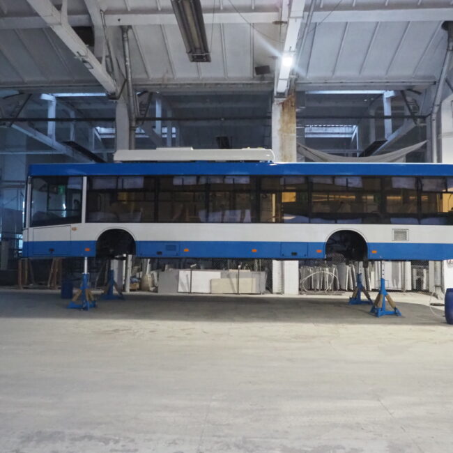 The birth of a trolley. In this Informbusiness shed, a new trolley is getting its heart and brain. Up to 80 trolleybuses like this one will be assembled in the next half a year. Photo credit: Journo Birds