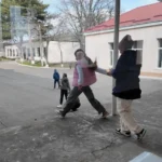 Schoolyard is a place for a quick football game!