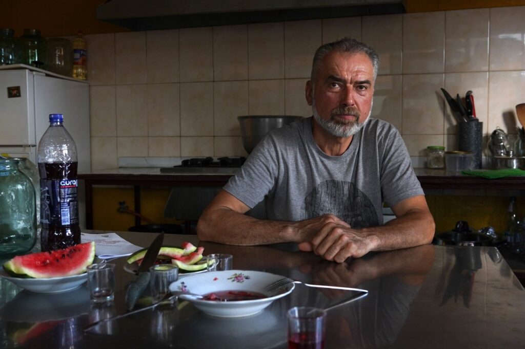 On the table in Ivan Cilcic’s kitchen lies the charter of Gagauzian rights (in Russian).