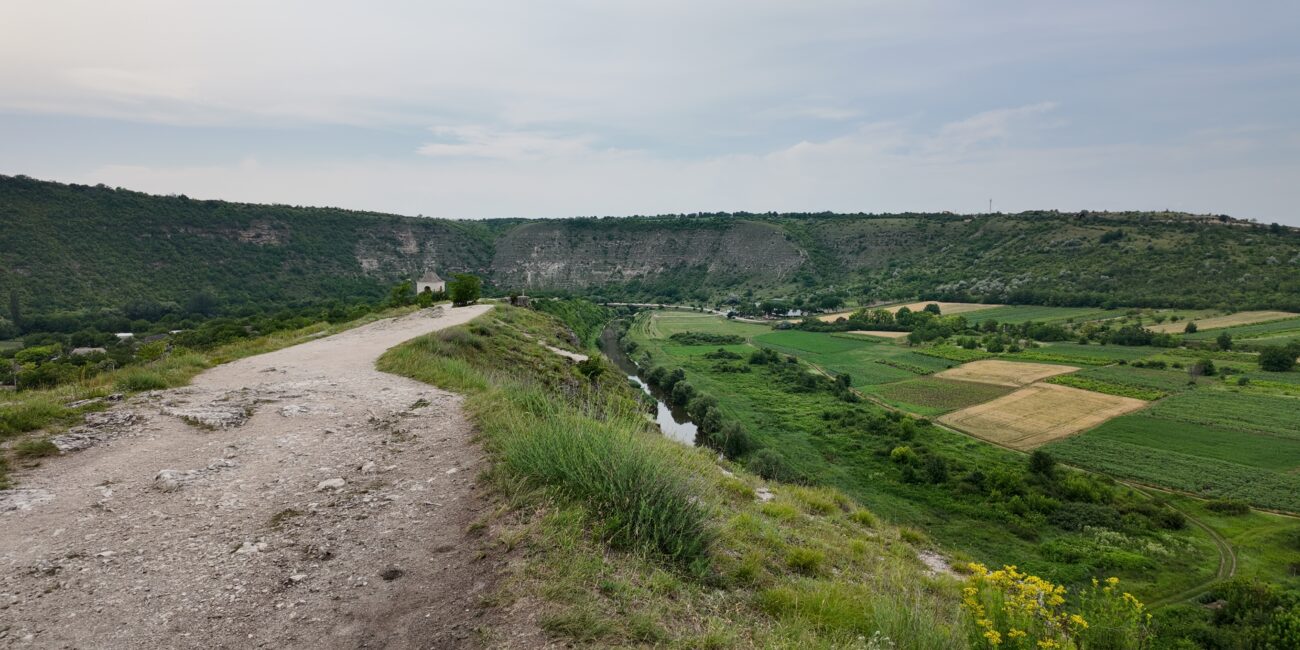 We only walk by the Peștera cave monastery (visible in the picture) and head off-road to find another lesser-known monastery.